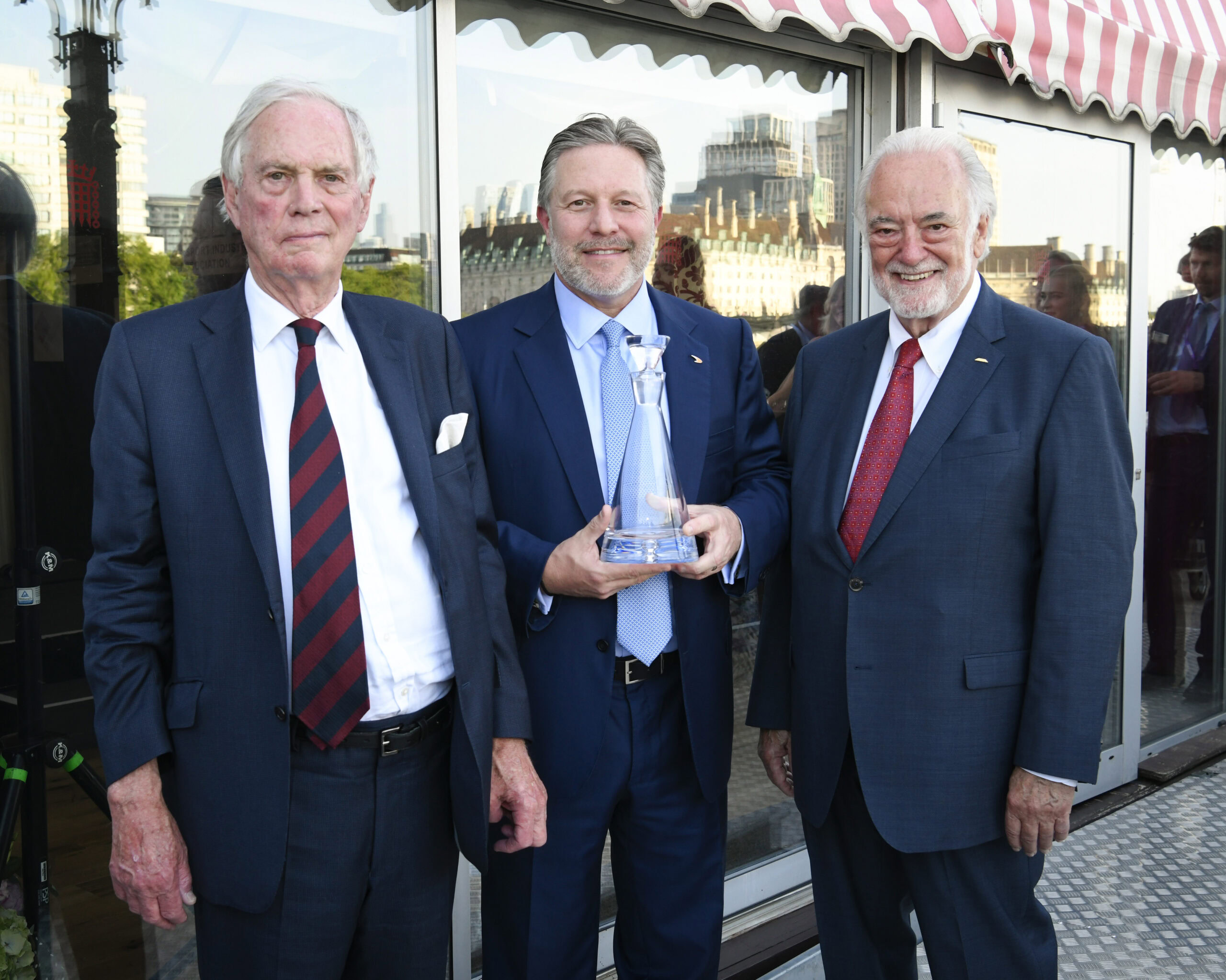 The Rt Hon the Lord Astor of Hever Zak Brown and Chris Aylett